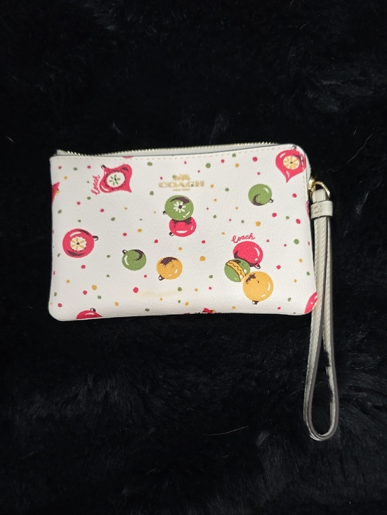 Coach Handbags - Coach Corner Zip Wristlet in the Chalk Multi colorway with an ornament print